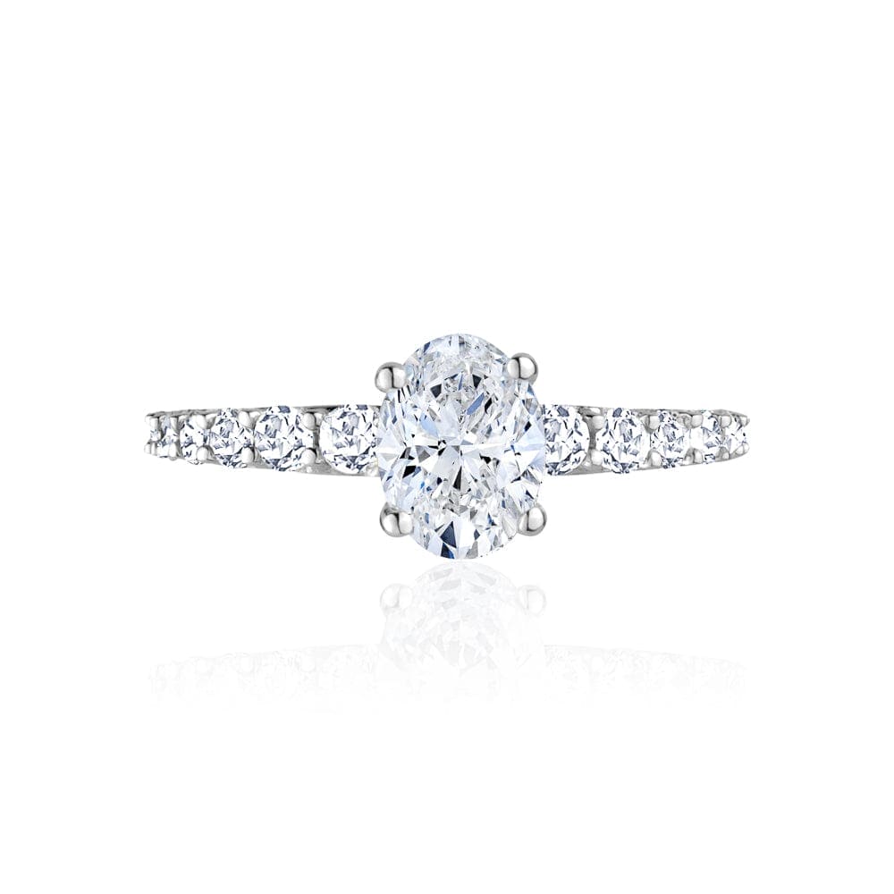 Oval Cut Diamond Engagement Ring With Graduating Side Stones
